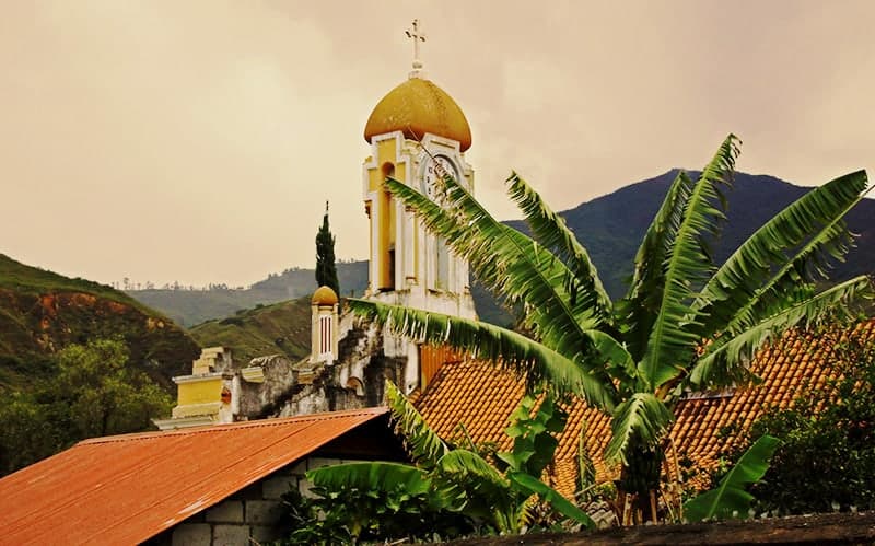 vilcabamba church sunshine and plants