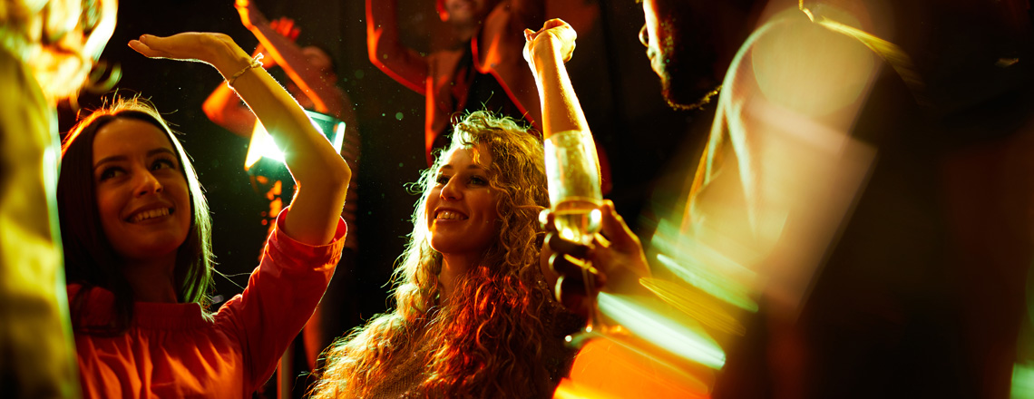 Girls dancing at nightclub in Cuenca, Ecuador