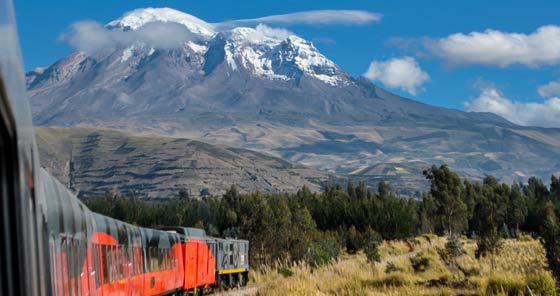 Train with Chimborazo Volcano in background in Riobamba